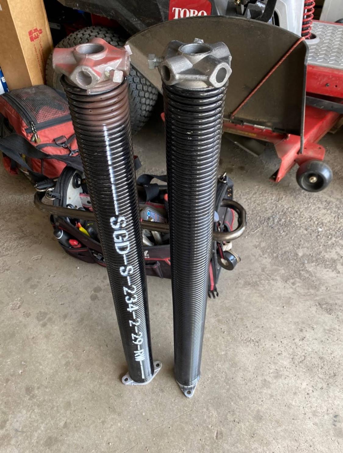 New heavy-duty torsion springs ready for install